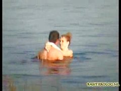 Paare gefangengenommenen beim Sex in Lake