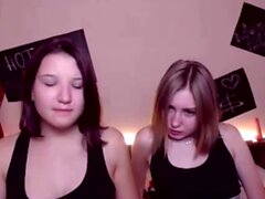 Two Lovely Lesbian Going Wild On Cam