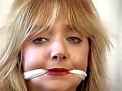 Cute blonde bound, gagged and teased by her master