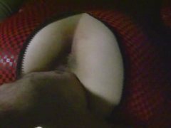 Wife's stretched ass getting toyed before squirting all over her sex suit.